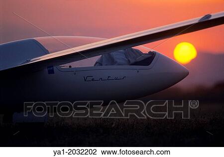 "Glider plane Ventus on sunset, Santa Cilia de Jaca aerodrome, Aragon, Spain. " View Large Photo Image Stock Image - "Glider plane Ventus on sunset, Santa Cilia de Jaca aerodrome, Aragon, Spain. ". Fotosearch