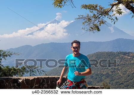 Stock Image - "Guatemala, Antigua, man running. ". Fotosearch