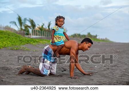 "Guatemala, El Paredon, father playing with daughter. " View Large Photo Image Stock Photography - "Guatemala, El Paredon, father playing with daughter. ". Fotosearch