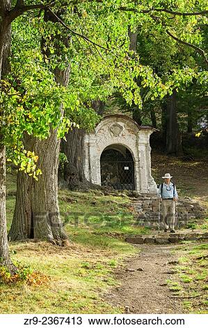 "Hiker descending a path at the Stations of the Cross, Calvary, built by a Jesuit priest in 1744, Banska Stiavnica, Slovakia, Europe. " View Large Photo Image Stock Image - "Hiker descending a path at the Stations of the Cross, Calvary, built by a Jesuit priest in 1744, Banska Stiavnica, Slovakia, Europe. ". Fotosearch