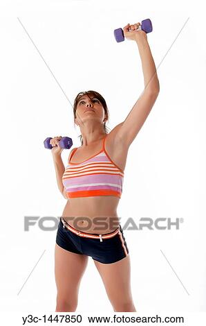 Hispanic woman exercising fitness View Large Photo Image Stock Image - Hispanic woman exercising fitness. Fotosearch
