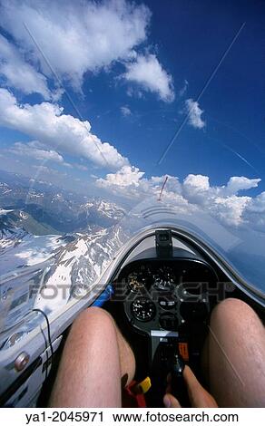 "Inside view of glider plane flying over Pena Collarada mountains, Aragon, Spain" View Large Photo Image Stock Image - "Inside view of glider plane flying over Pena Collarada mountains, Aragon, Spain". Fotosearch
