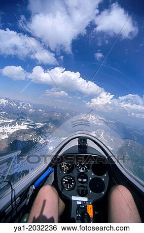 "Inside view of glider plane flying over Pena Collarada mountains, Aragon, Spain" View Large Photo Image Stock Photograph - "Inside view of glider plane flying over Pena Collarada mountains, Aragon, Spain". Fotosearch