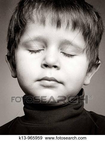 Little boy with eyes closed View Large Photo Image Stock Photo - Little boy with eyes closed. Fotosearch