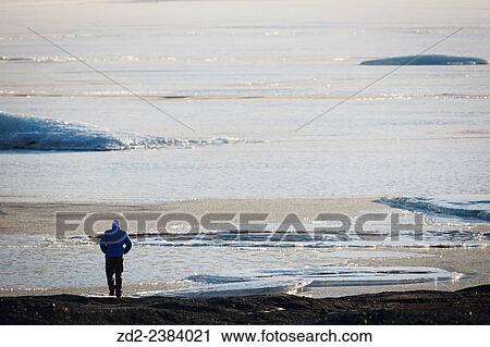 Man walking on Skaftafellsjokull glacier. Vatnajokull National Park. Iceland. View Large Photo Image Stock Image - Man walking on Skaftafellsjokull glacier. Vatnajokull National Park. Iceland.. Fotosearch