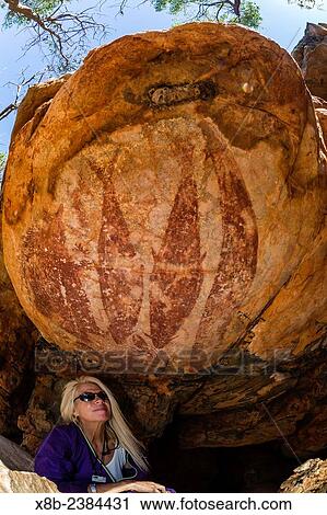 "National Geographic Orion staff CT Ticknor with rock art endemic to the Kimberley, called Gwion Gwion, or Bradshaw Art, Vansittart Bay, Kimberley, Western Australia, Australia. " View Large Photo Image Stock Image - "National Geographic Orion staff CT Ticknor with rock art endemic to the Kimberley, called Gwion Gwion, or Bradshaw Art, Vansittart Bay, Kimberley, Western Australia, Australia. ". Fotosearch