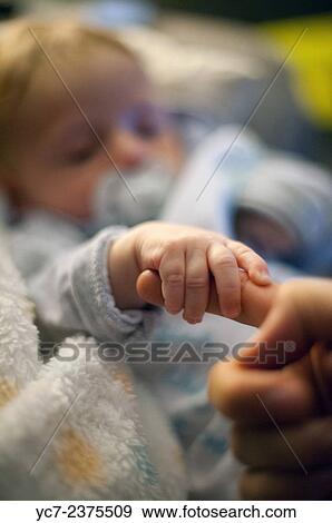 Stock Photo - newborn baby.. Fotosearch