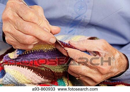 Old woman crocheting View Large Photo Image Stock Image - Old woman crocheting. Fotosearch