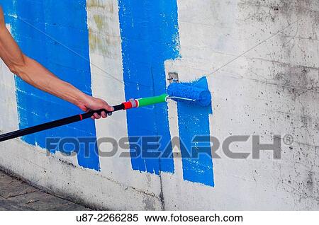 Stock Photography - Platen Paint Roller Blue.. Fotosearch