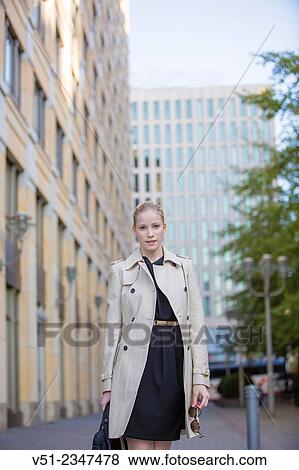 Portrait of a businesswoman in downtown looking at camera View Large Photo Image Stock Photo - Portrait of a businesswoman in downtown looking at camera. Fotosearch