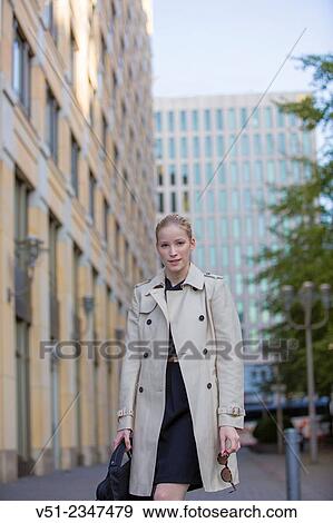 Stock Photo - Portrait of a businesswoman in downtown looking at camera. Fotosearch