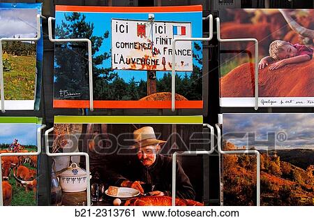 Stock Image - "Postcard stand at Maurs, Cantal, Auvergne, France". Fotosearch