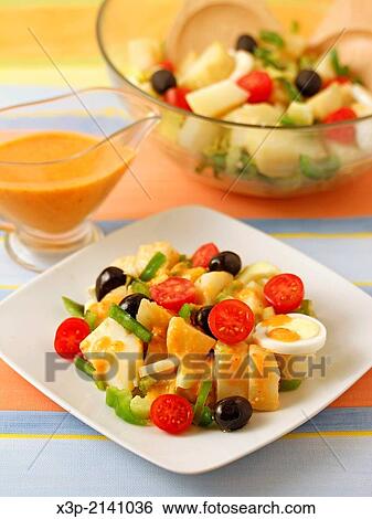 Stock Photograph - Potato salad with romesco sauce.. Fotosearch