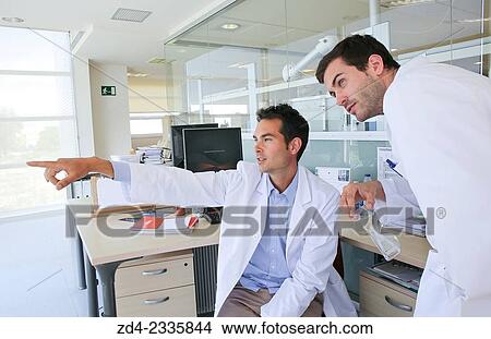 "Researchers in hallway laboratory. Chemical Analysis Laboratory. Technological Services to Industry. Tecnalia Research & Innovation, Donostia, San Sebastian, Gipuzkoa, Basque Country, Spain. " View Large Photo Image Picture - "Researchers in hallway laboratory. Chemical Analysis Laboratory. Technological Services to Industry. Tecnalia Research & Innovation, Donostia, San Sebastian, Gipuzkoa, Basque Country, Spain. ". Fotosearch