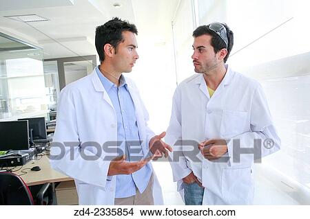 "Researchers in hallway laboratory. Chemical Analysis Laboratory. Technological Services to Industry. Tecnalia Research & Innovation, Donostia, San Sebastian, Gipuzkoa, Basque Country, Spain. " View Large Photo Image Picture - "Researchers in hallway laboratory. Chemical Analysis Laboratory. Technological Services to Industry. Tecnalia Research & Innovation, Donostia, San Sebastian, Gipuzkoa, Basque Country, Spain. ". Fotosearch
