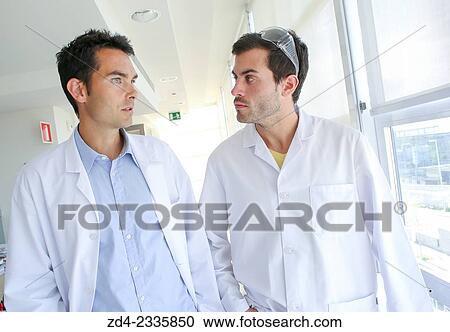 Stock Image - "Researchers in hallway laboratory. Chemical Analysis Laboratory. Technological Services to Industry. Tecnalia Research & Innovation, Donostia, San Sebastian, Gipuzkoa, Basque Country, Spain. ". Fotosearch