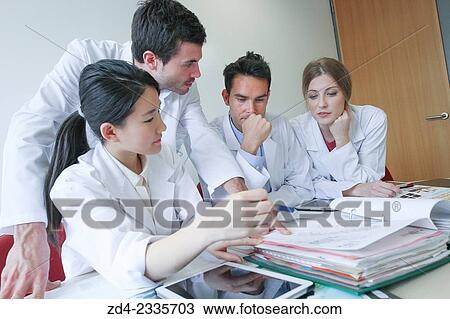 Stock Image - "Researchers in meeting room. Technological Services to Industry. Tecnalia Research & Innovation, Donostia, San Sebastian, Gipuzkoa, Basque Country, Spain. ". Fotosearch