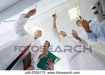 Stock Image - "Researchers in meeting room. Technological Services to Industry. Tecnalia Research & Innovation, Donostia, San Sebastian, Gipuzkoa, Basque Country, Spain. ". Fotosearch