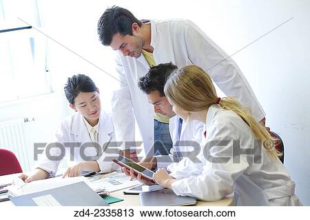 Stock Image - "Researchers in meeting room. Technological Services to Industry. Tecnalia Research & Innovation, Donostia, San Sebastian, Gipuzkoa, Basque Country, Spain. ". Fotosearch