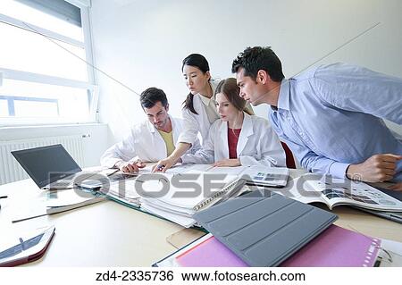 Stock Photograph - "Researchers in meeting room. Technological Services to Industry. Tecnalia Research & Innovation, Donostia, San Sebastian, Gipuzkoa, Basque Country, Spain. ". Fotosearch
