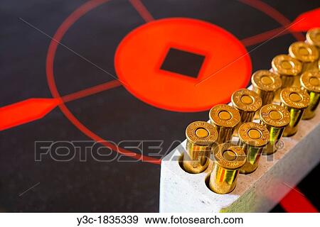 Rifle Ammunition caliber 30-30 on target disk View Large Photo Image Stock Photo - Rifle Ammunition caliber 30-30 on target disk. Fotosearch