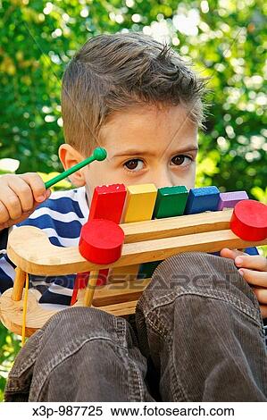 Stock Photography - Shy kid. Fotosearch