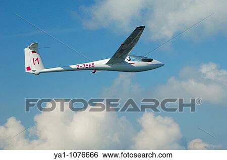 Single seat glider Asw 19b in flight over french Lorraine countryside - France View Large Photo Image Stock Photograph - Single seat glider Asw 19b in flight over french Lorraine countryside - France. Fotosearch