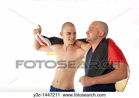Skinhead hooligans cheering with Germany flag View Large Photo Image Stock Image - Skinhead hooligans cheering with Germany flag. Fotosearch