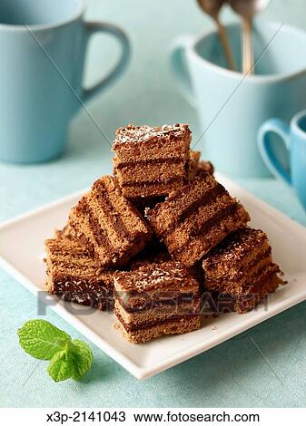 Sponge cake with chocolate and cinnamon. View Large Photo Image Stock Image - Sponge cake with chocolate and cinnamon.. Fotosearch