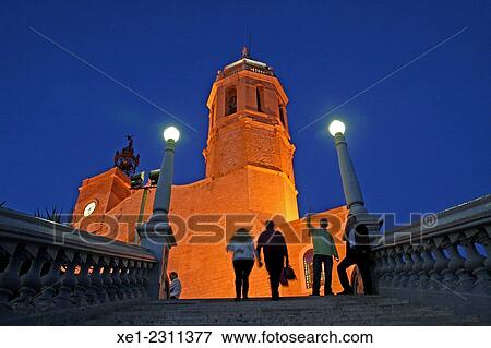 Stock Photo - "Stairs, Church of Sant Bartomeu i Santa Tecla at night, Sitges, Catalonia, Spain". Fotosearch