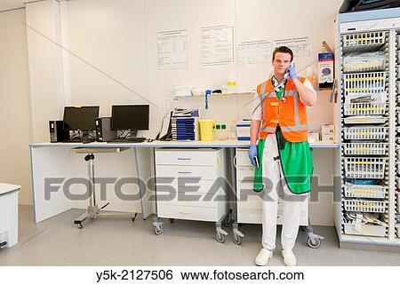 "Tilburg, Netherlands. Trauma surgeon in a hospitals trauma room, preparing to recieve a patient, on it´s way by ambulance. " View Large Photo Image Stock Photograph - "Tilburg, Netherlands. Trauma surgeon in a hospitals trauma room, preparing to recieve a patient, on it´s way by ambulance. ". Fotosearch