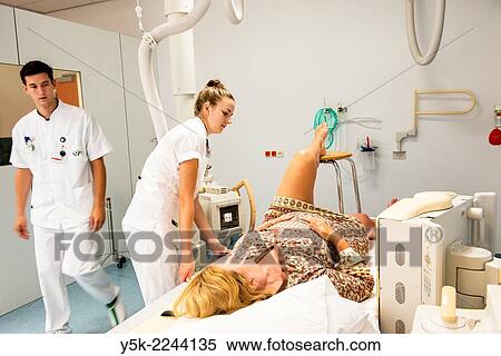 "Tilburg, Netherlands. Two radio therapists working together to produce a post operative X-Ray of a patient, who just received a new hip in surgery. " View Large Photo Image Stock Photography - "Tilburg, Netherlands. Two radio therapists working together to produce a post operative X-Ray of a patient, who just received a new hip in surgery. ". Fotosearch