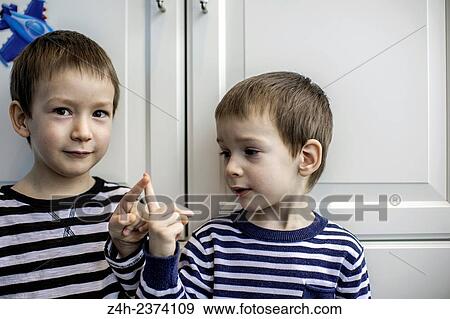 Stock Photo - Twins brothers.. Fotosearch