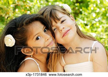 Two little girls View Large Photo Image Stock Photograph - Two little girls. Fotosearch