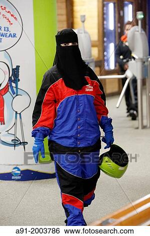 "United Arab Emirates (UAE), Dubai, the Emirates mall with 700 shops and a world famous alpine ski run with lift on real artifical snow, veiled woman in ski gear" View Large Photo Image Stock Photograph - "United Arab Emirates (UAE), Dubai, the Emirates mall with 700 shops and a world famous alpine ski run with lift on real artifical snow, veiled woman in ski gear". Fotosearch