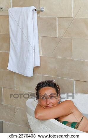 Woman in a bathtub. View Large Photo Image Stock Image - Woman in a bathtub.. Fotosearch