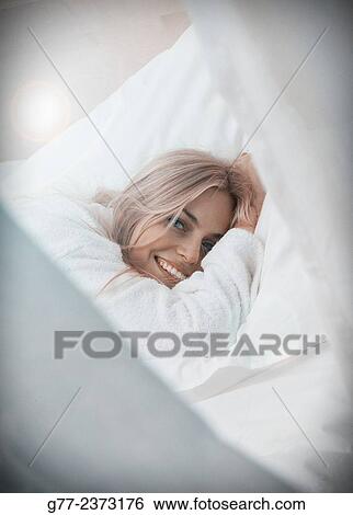 "Woman in bed. New York, USA" View Large Photo Image Stock Photograph - "Woman in bed. New York, USA". Fotosearch