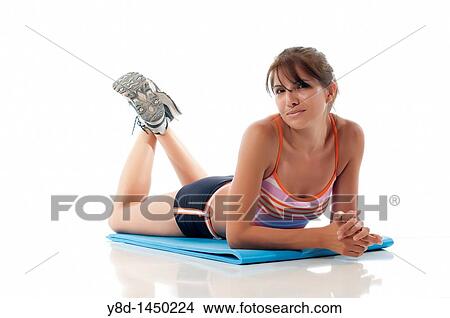 Woman on fitness mat ready to work out View Large Photo Image Picture - Woman on fitness mat ready to work out. Fotosearch