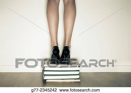 "Woman ove a stack of books. New York, USA" View Large Photo Image Stock Image - "Woman ove a stack of books. New York, USA". Fotosearch