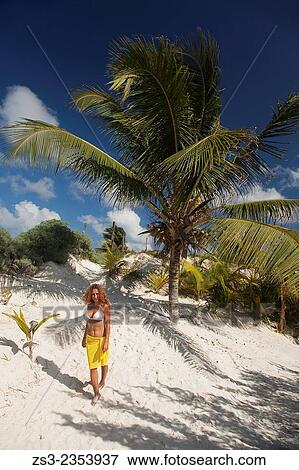 "Woman posing at the beach of Tulum, Quintana Roo, Yucatan Province, Mexico, Central America. " View Large Photo Image Stock Photo - "Woman posing at the beach of Tulum, Quintana Roo, Yucatan Province, Mexico, Central America. ". Fotosearch