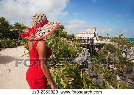 "Woman posing at Tulum Ruins, Quintana Roo, Yucatan Province, Mexico, Central America. " View Large Photo Image Stock Photo - "Woman posing at Tulum Ruins, Quintana Roo, Yucatan Province, Mexico, Central America. ". Fotosearch