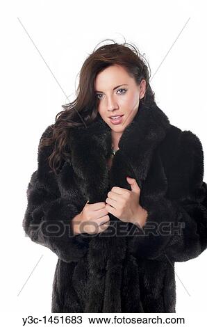 Stock Image - Woman wearing mink coat. Fotosearch