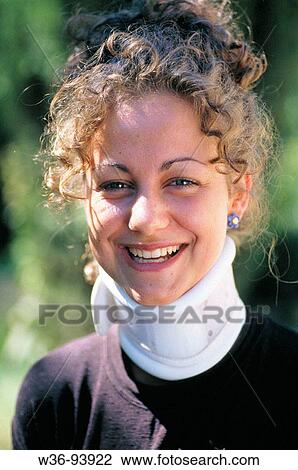 Stock Image - Woman with cervical collar. Fotosearch