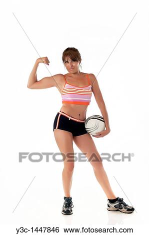 Woman with soccer ball showing muscles View Large Photo Image Stock Photograph - Woman with soccer ball showing muscles. Fotosearch