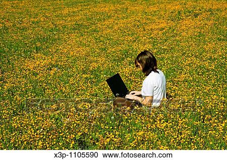 Working on grass View Large Photo Image Stock Image - Working on grass. Fotosearch
