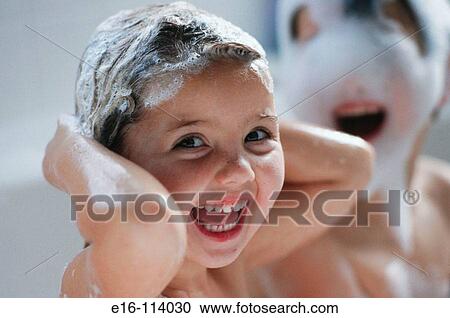 Young girl in bath washing hair View Large Photo Image Stock Image - Young girl in bath washing hair. Fotosearch