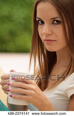 Young woman drinking cofee. Balearic Islands. Spain View Large Photo Image Stock Image - Young woman drinking cofee. Balearic Islands. Spain. Fotosearch