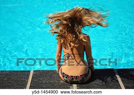 "young woman enjoying summer at swimming pool, Geneva, Switzerland" View Large Photo Image Stock Image - "young woman enjoying summer at swimming pool, Geneva, Switzerland". Fotosearch