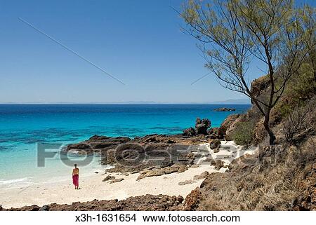 "young woman walking on the beach, Tsarabanjina island, Mitsio archipelago, Republic of Madagascar, Indian Ocean" View Large Photo Image Picture - "young woman walking on the beach, Tsarabanjina island, Mitsio archipelago, Republic of Madagascar, Indian Ocean". Fotosearch
