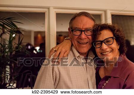 70 year old couple at a party View Large Photo Image Stock Photo - 70 year old couple at a party. Fotosearch